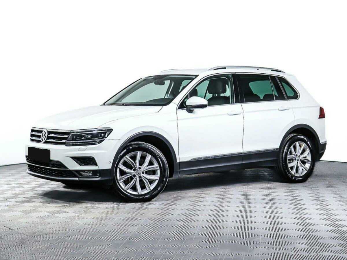 Купить Volkswagen Tiguan с пробегом. Посмотреть фото