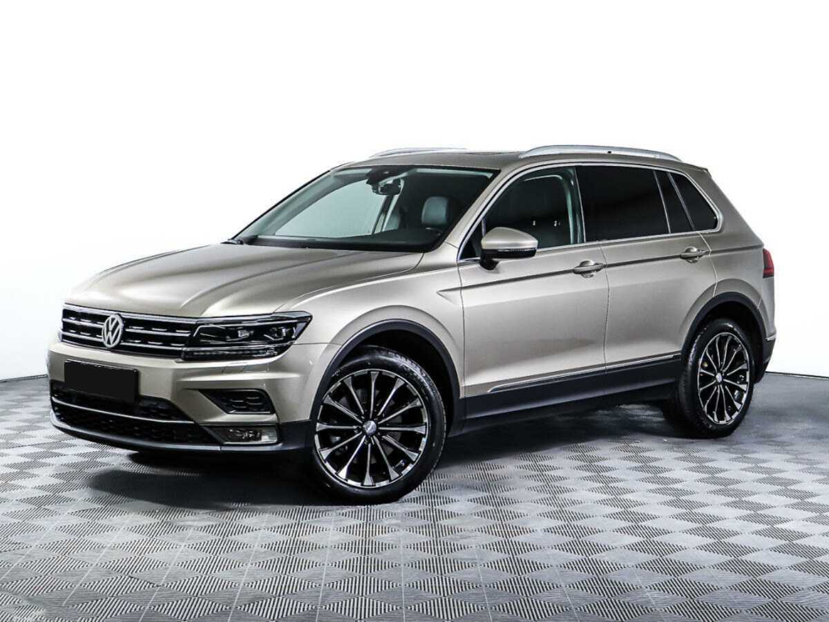 Купить Volkswagen Tiguan с пробегом. Посмотреть фото