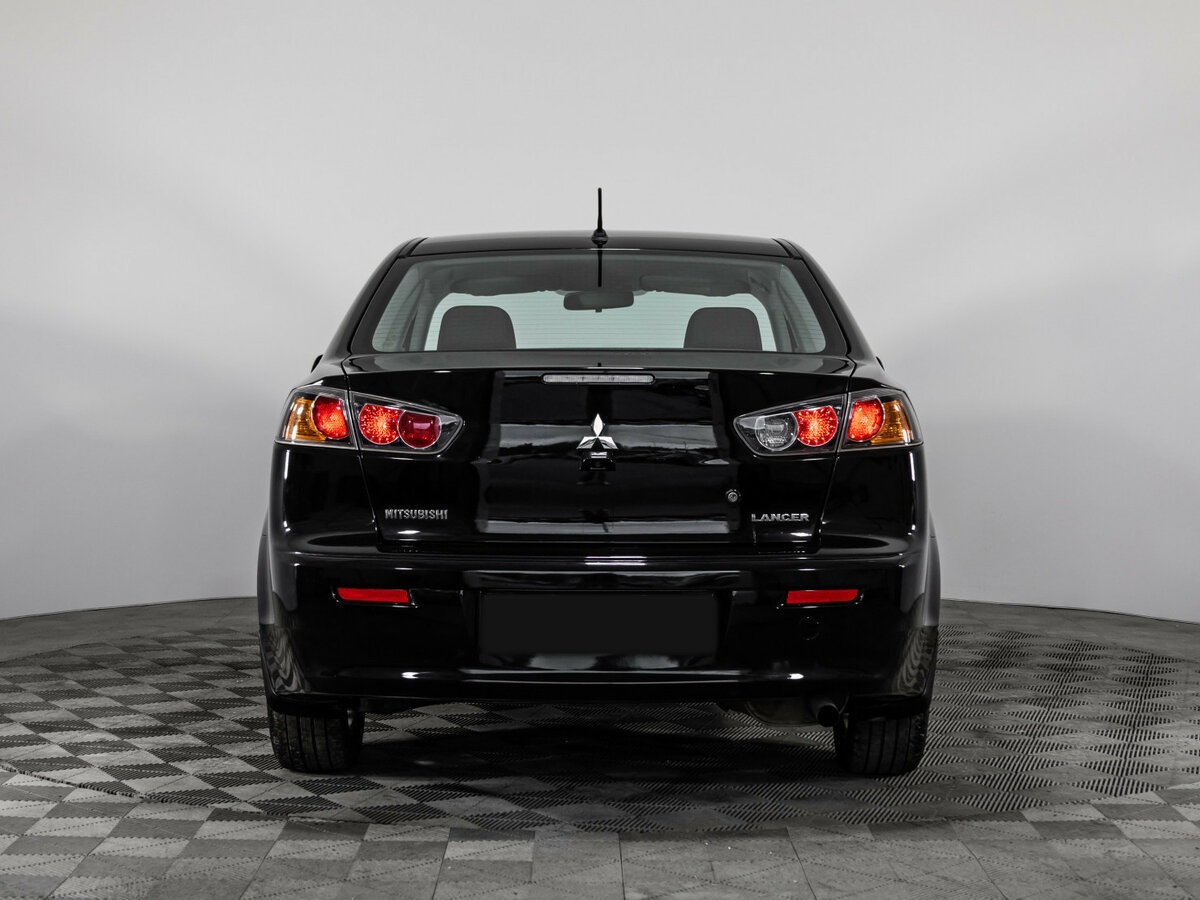 Купить Mitsubishi Lancer с пробегом. Фото: #4
