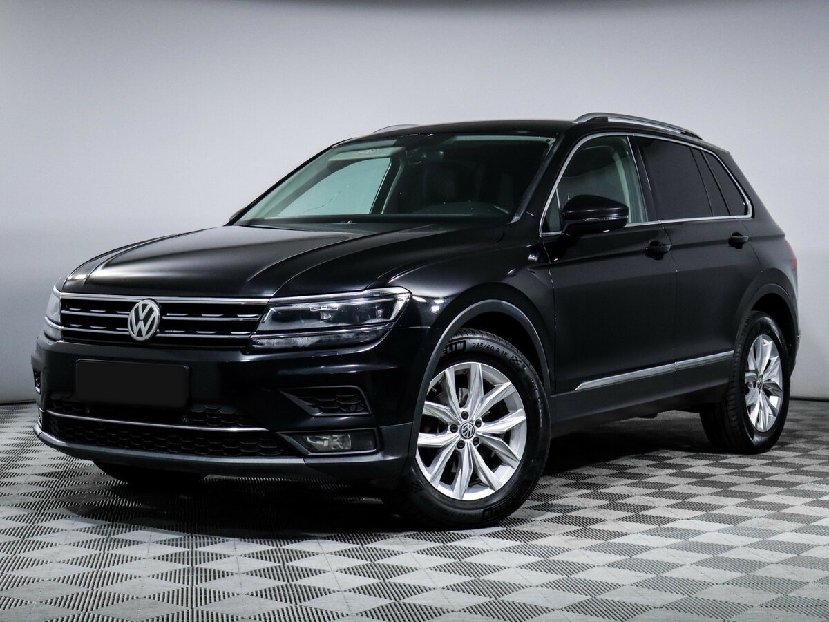 Купить Volkswagen Tiguan с пробегом. Посмотреть фото