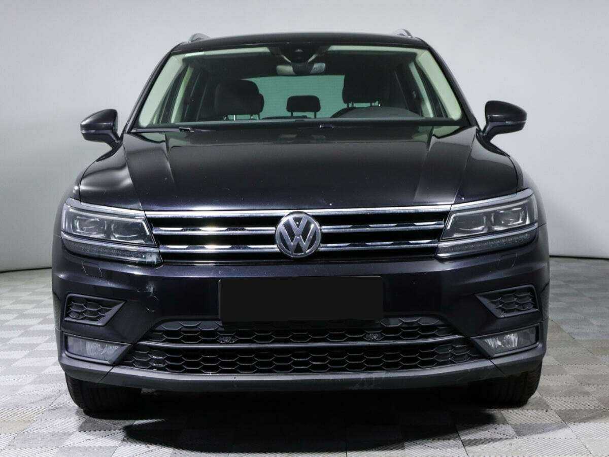 Купить Volkswagen Tiguan с пробегом. Посмотреть фото