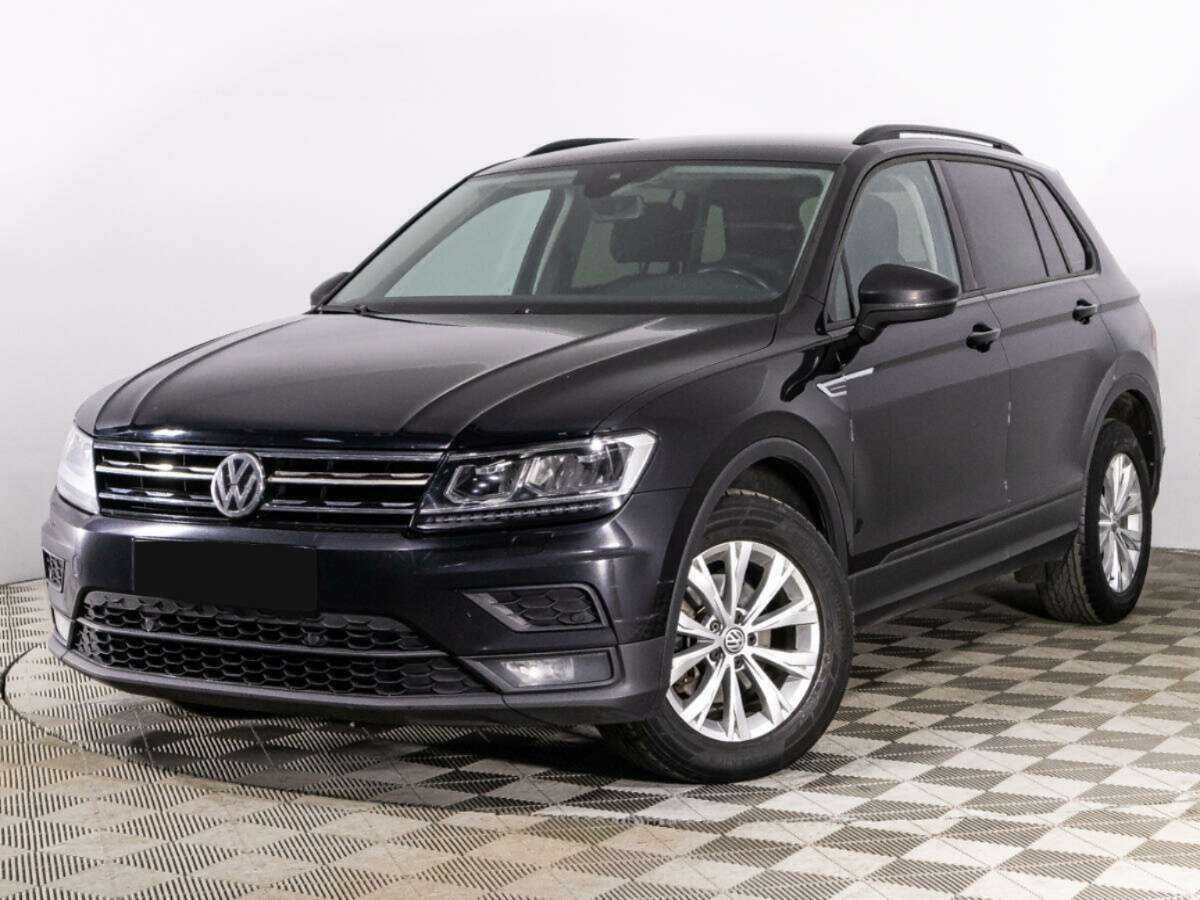 Купить Volkswagen Tiguan с пробегом. Посмотреть фото