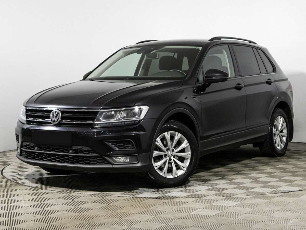 Купить Volkswagen Tiguan с пробегом. Посмотреть фото