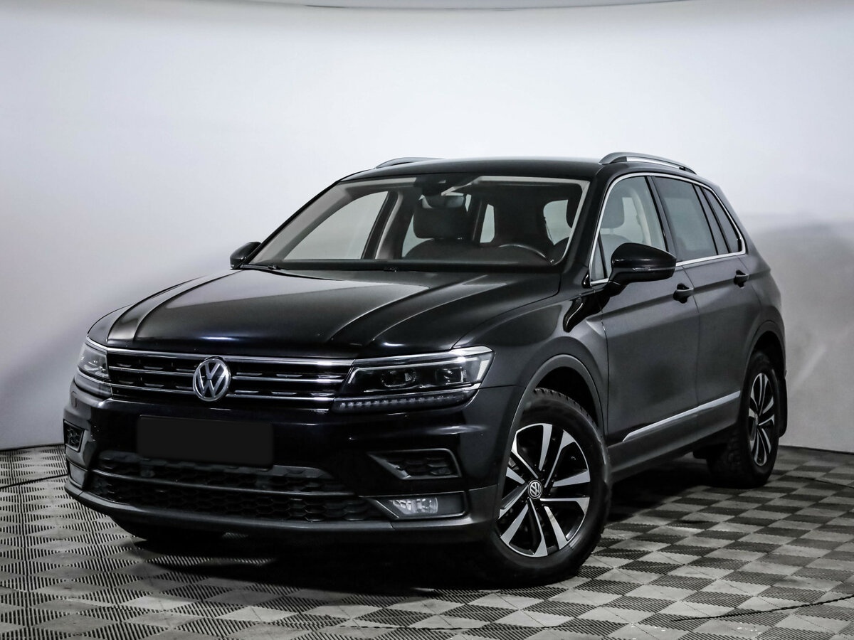 Купить Volkswagen Tiguan с пробегом. Посмотреть фото