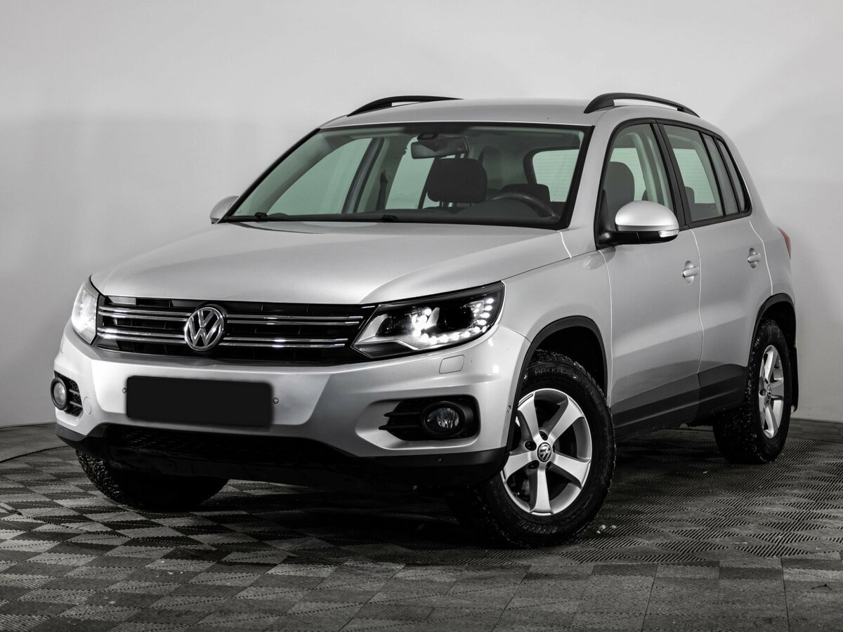 Купить Volkswagen Tiguan с пробегом. Посмотреть фото