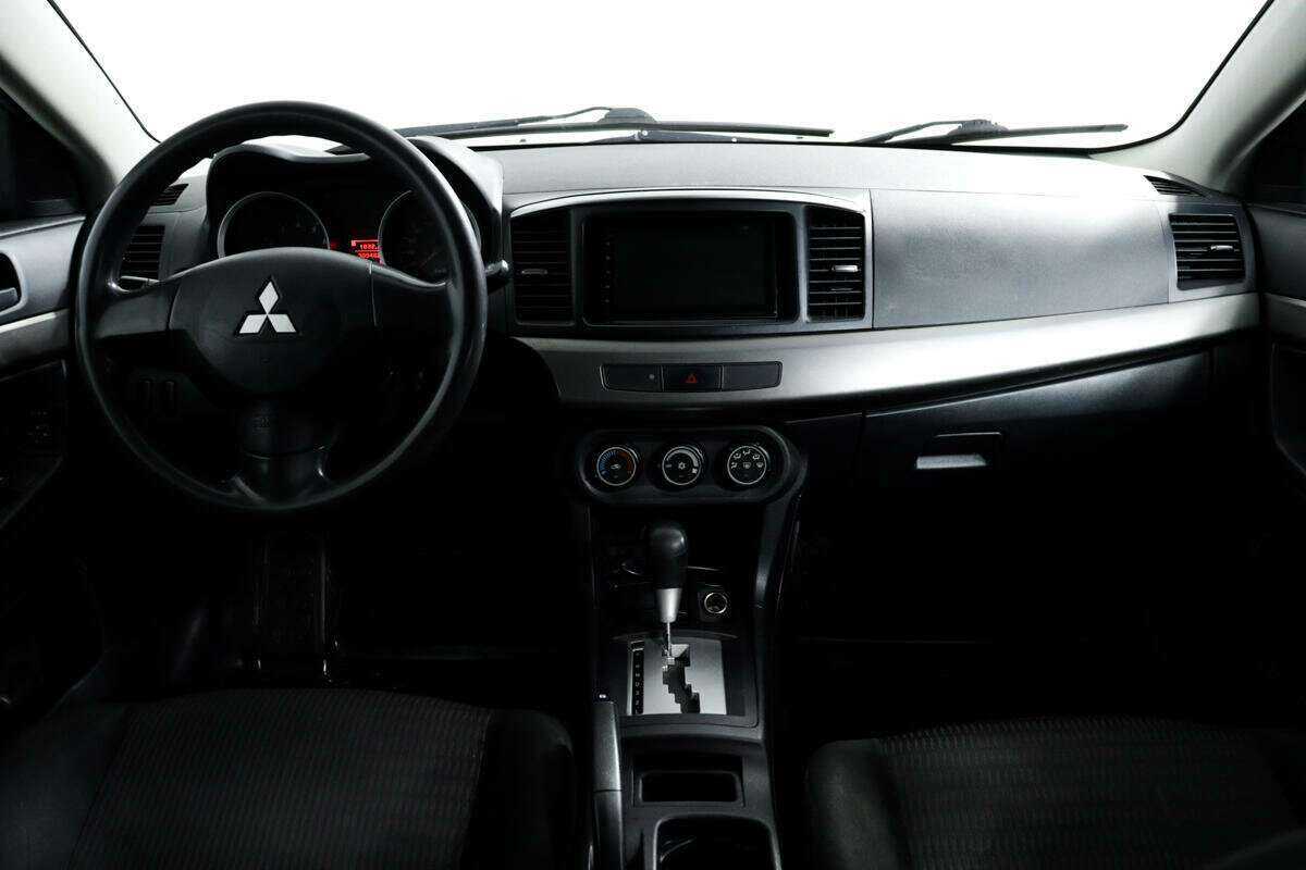 Купить Mitsubishi Lancer с пробегом. Фото: #10