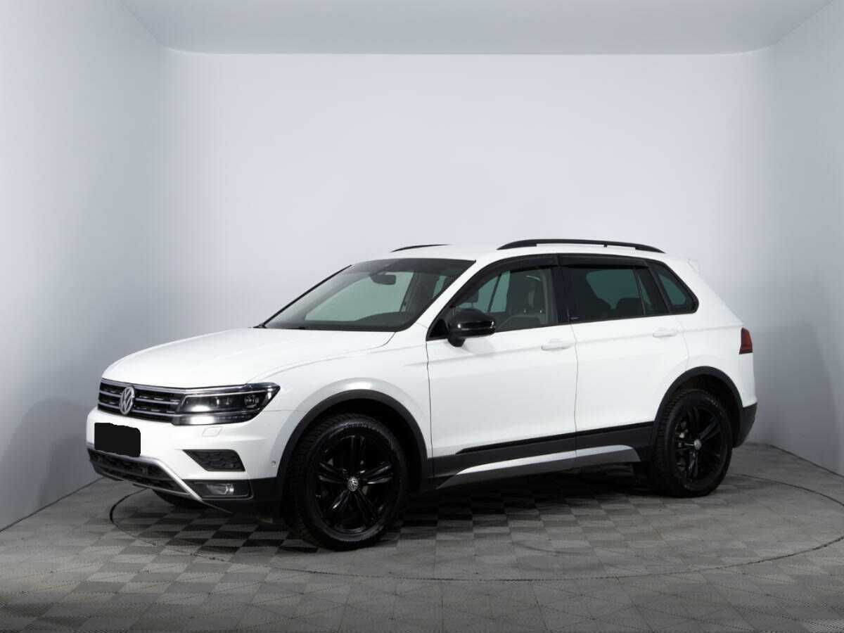 Купить Volkswagen Tiguan с пробегом. Посмотреть фото