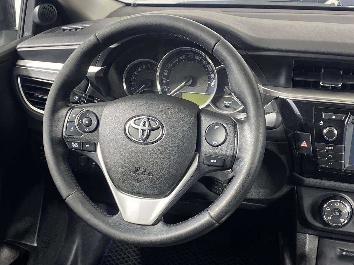 Купить Toyota Corolla с пробегом. Фото: #11