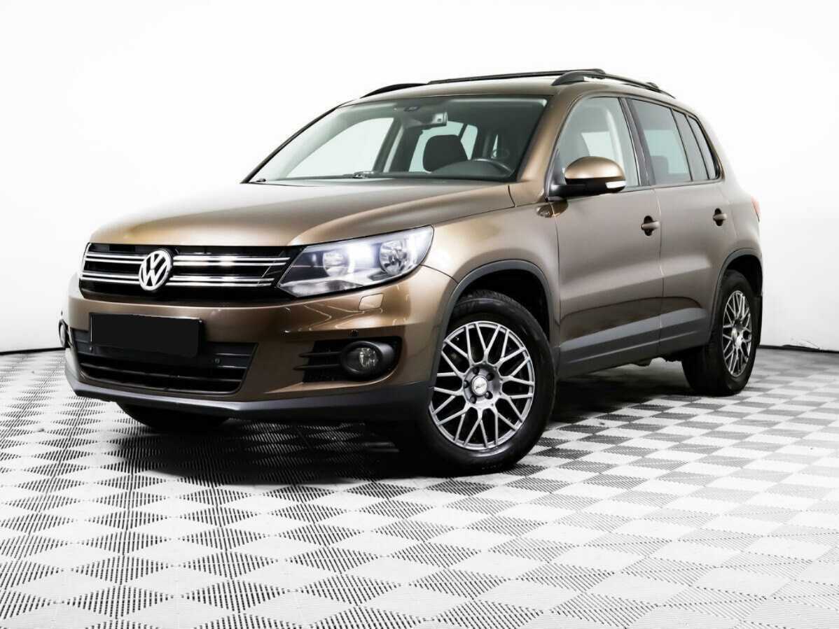 Купить Volkswagen Tiguan с пробегом. Посмотреть фото