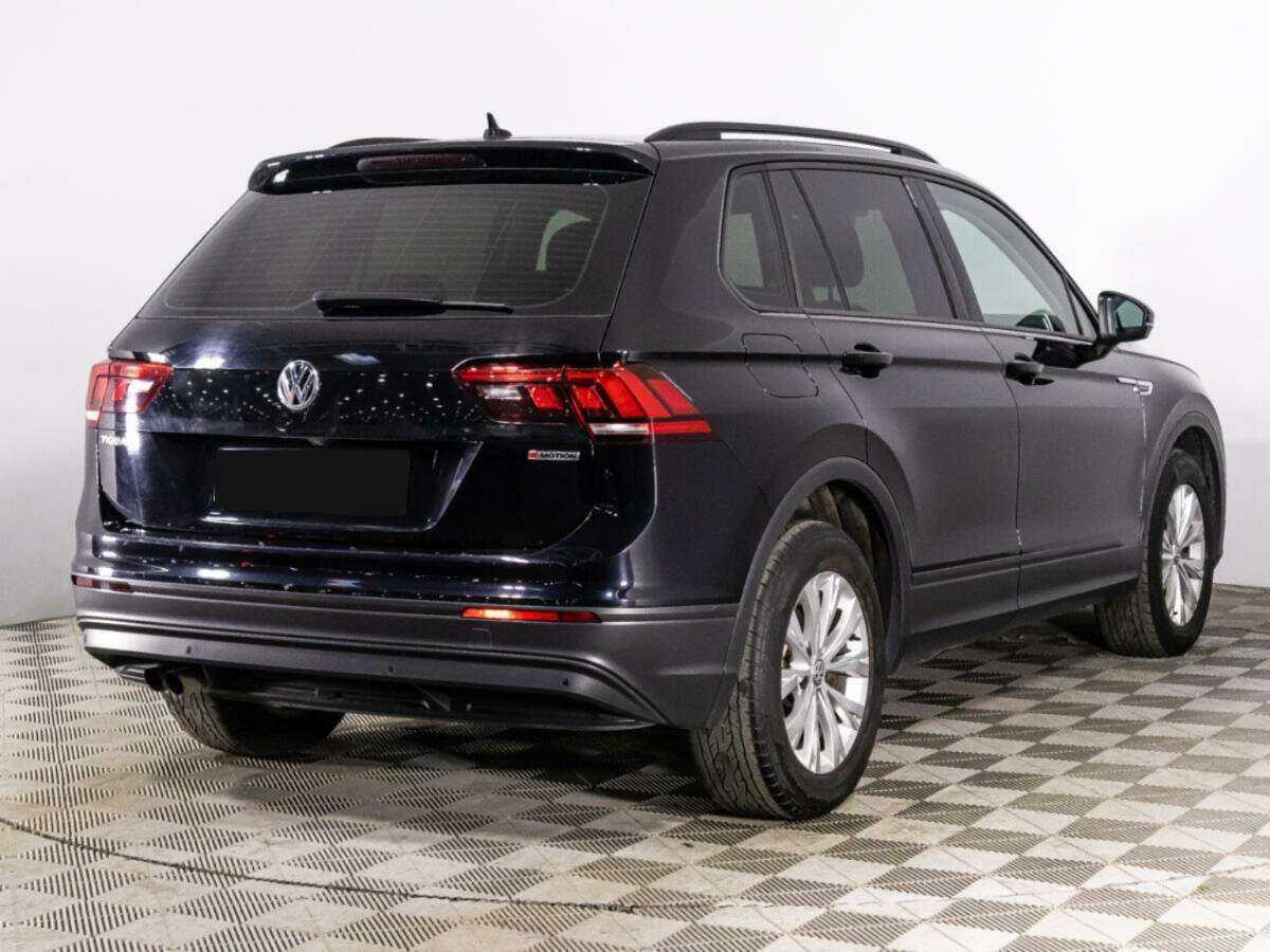 Купить Volkswagen Tiguan с пробегом. Фото: #4