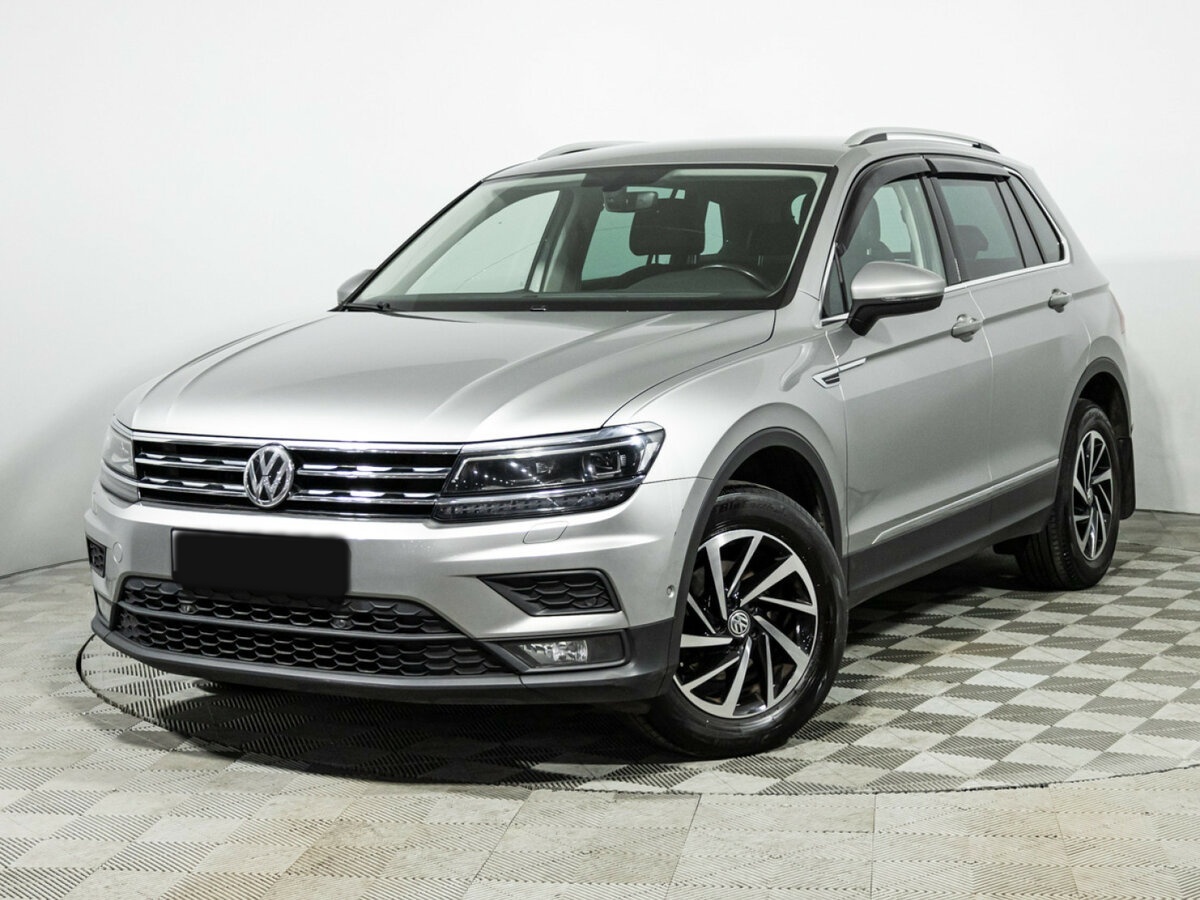 Купить Volkswagen Tiguan с пробегом. Посмотреть фото