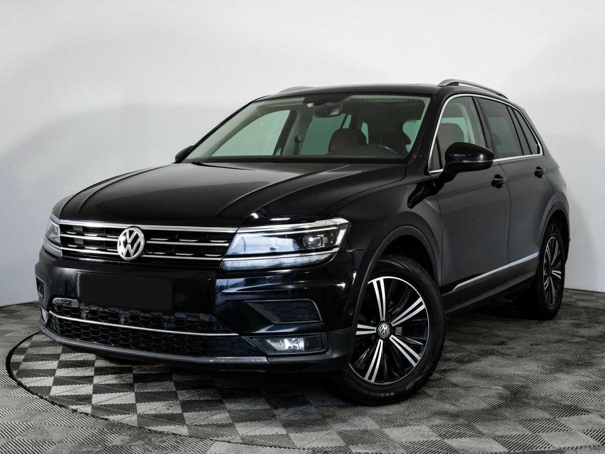 Купить Volkswagen Tiguan с пробегом. Посмотреть фото