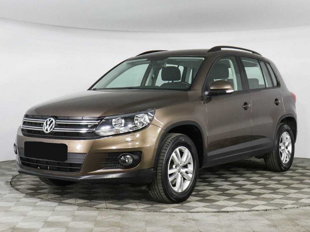 Купить Volkswagen Tiguan с пробегом. Посмотреть фото