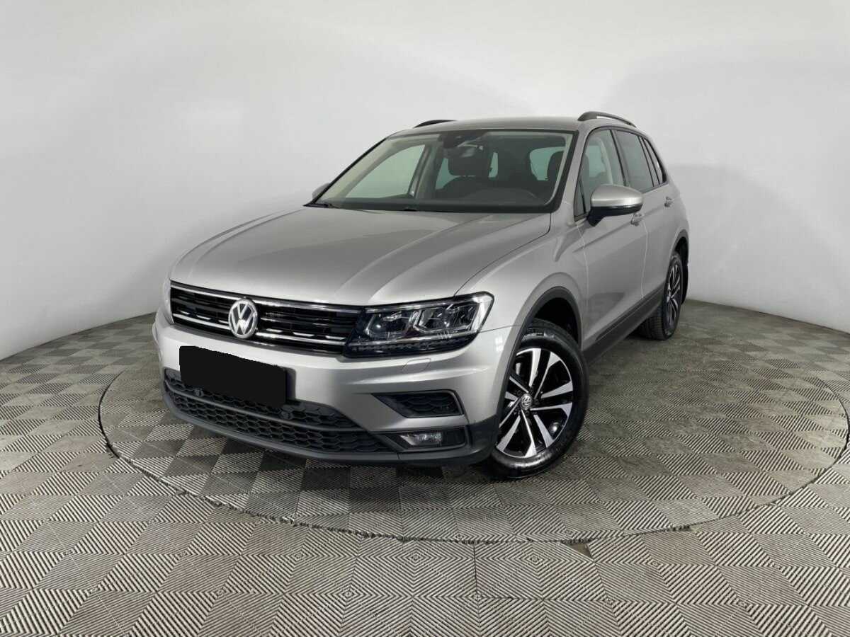 Купить Volkswagen Tiguan с пробегом. Посмотреть фото