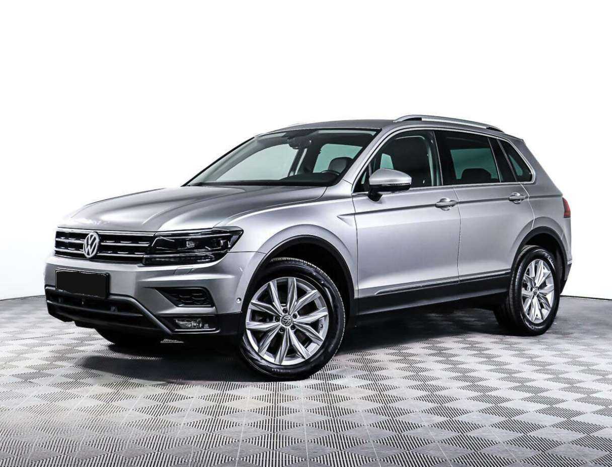 Купить Volkswagen Tiguan с пробегом. Посмотреть фото