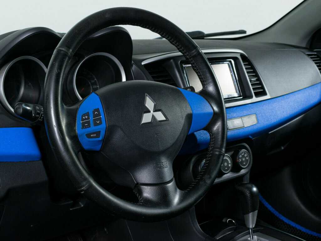 Купить Mitsubishi Lancer с пробегом. Фото: #9