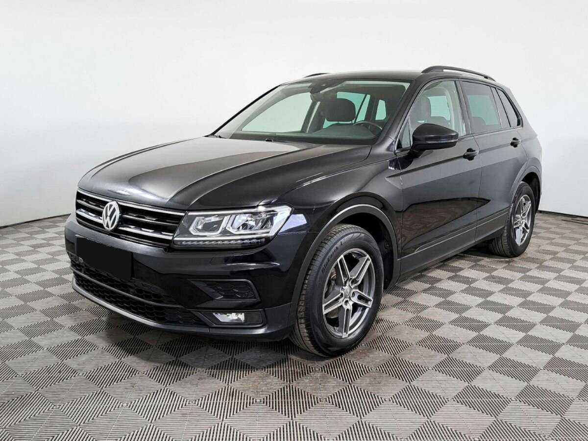 Купить Volkswagen Tiguan с пробегом. Посмотреть фото
