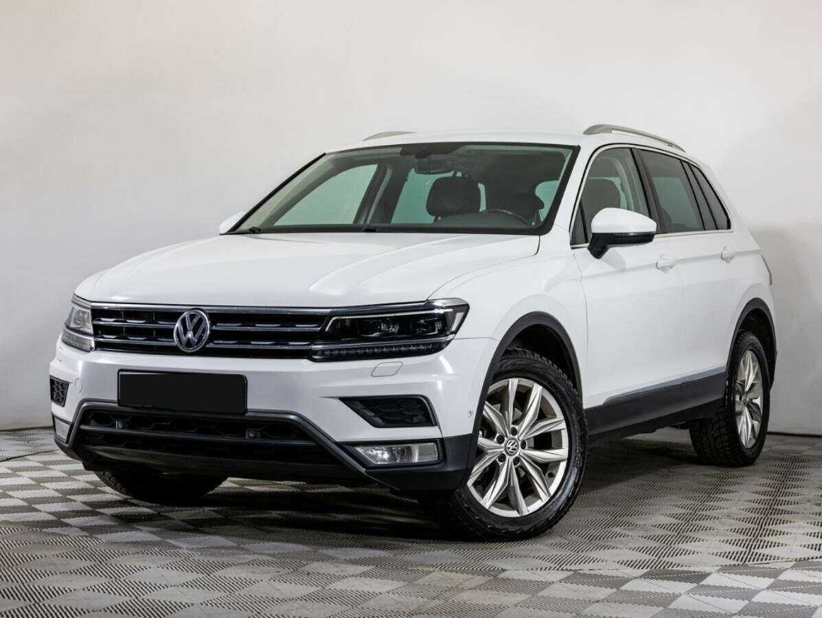Купить Volkswagen Tiguan с пробегом. Посмотреть фото
