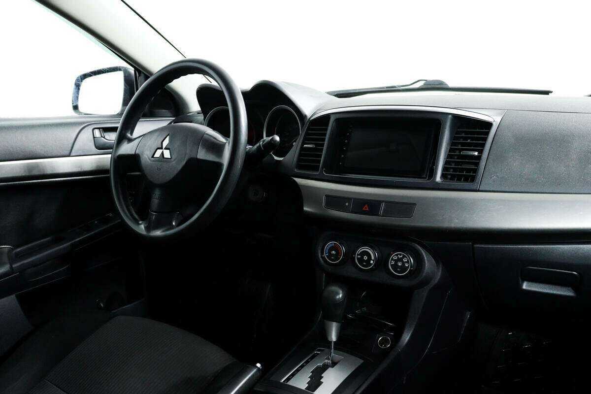 Купить Mitsubishi Lancer с пробегом. Фото: #8