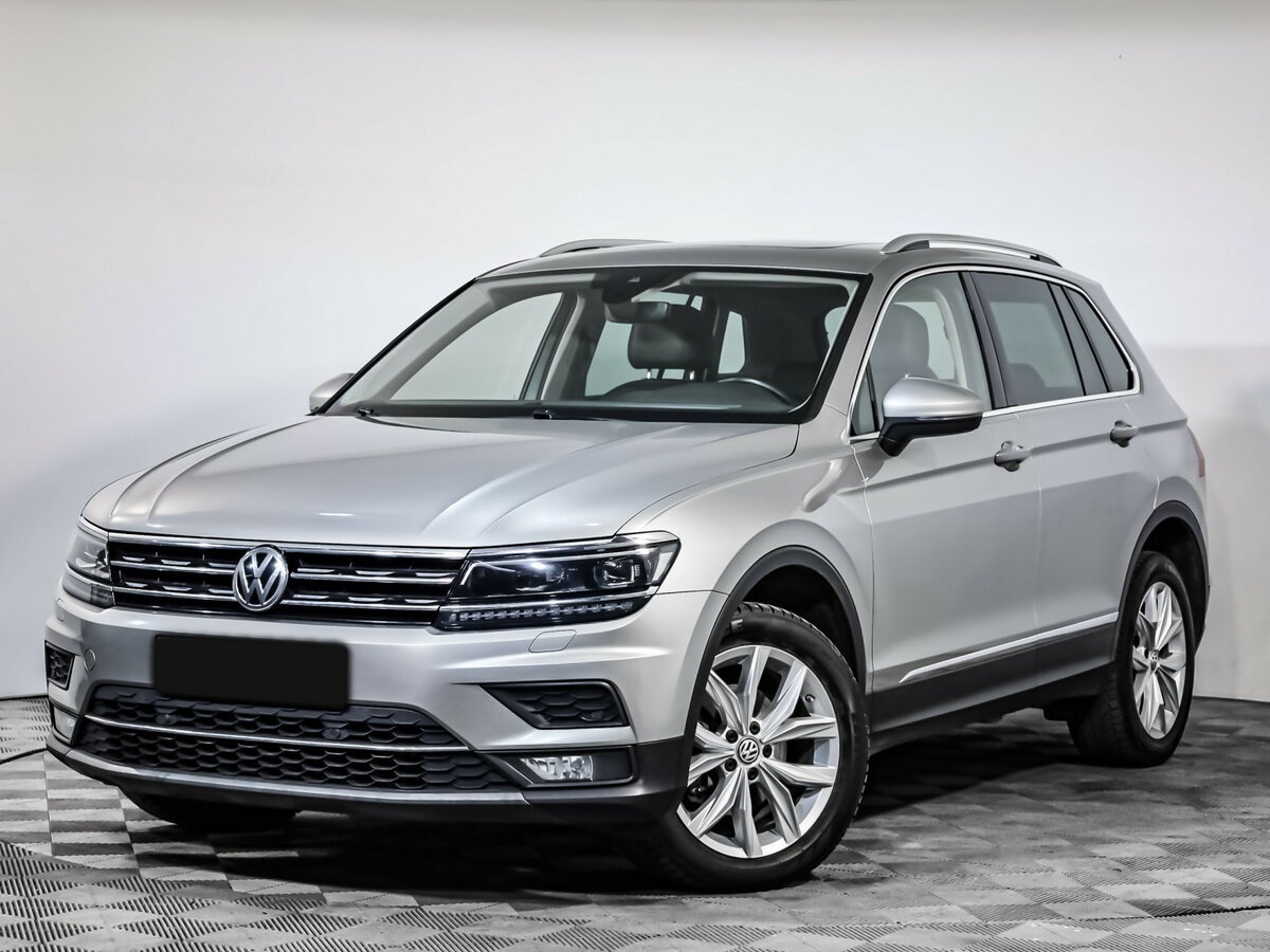 Купить Volkswagen Tiguan с пробегом. Посмотреть фото