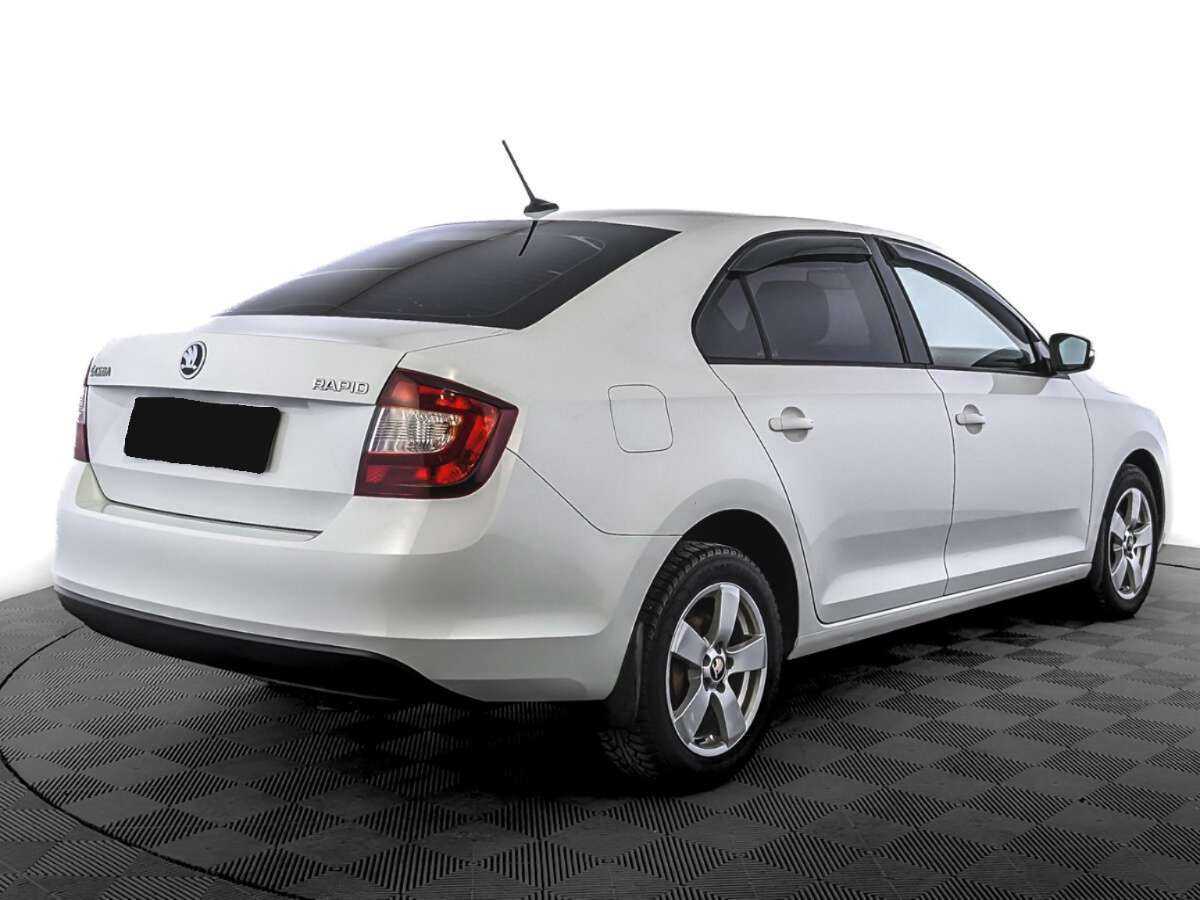 Купить Skoda Rapid с пробегом. Фото: #4