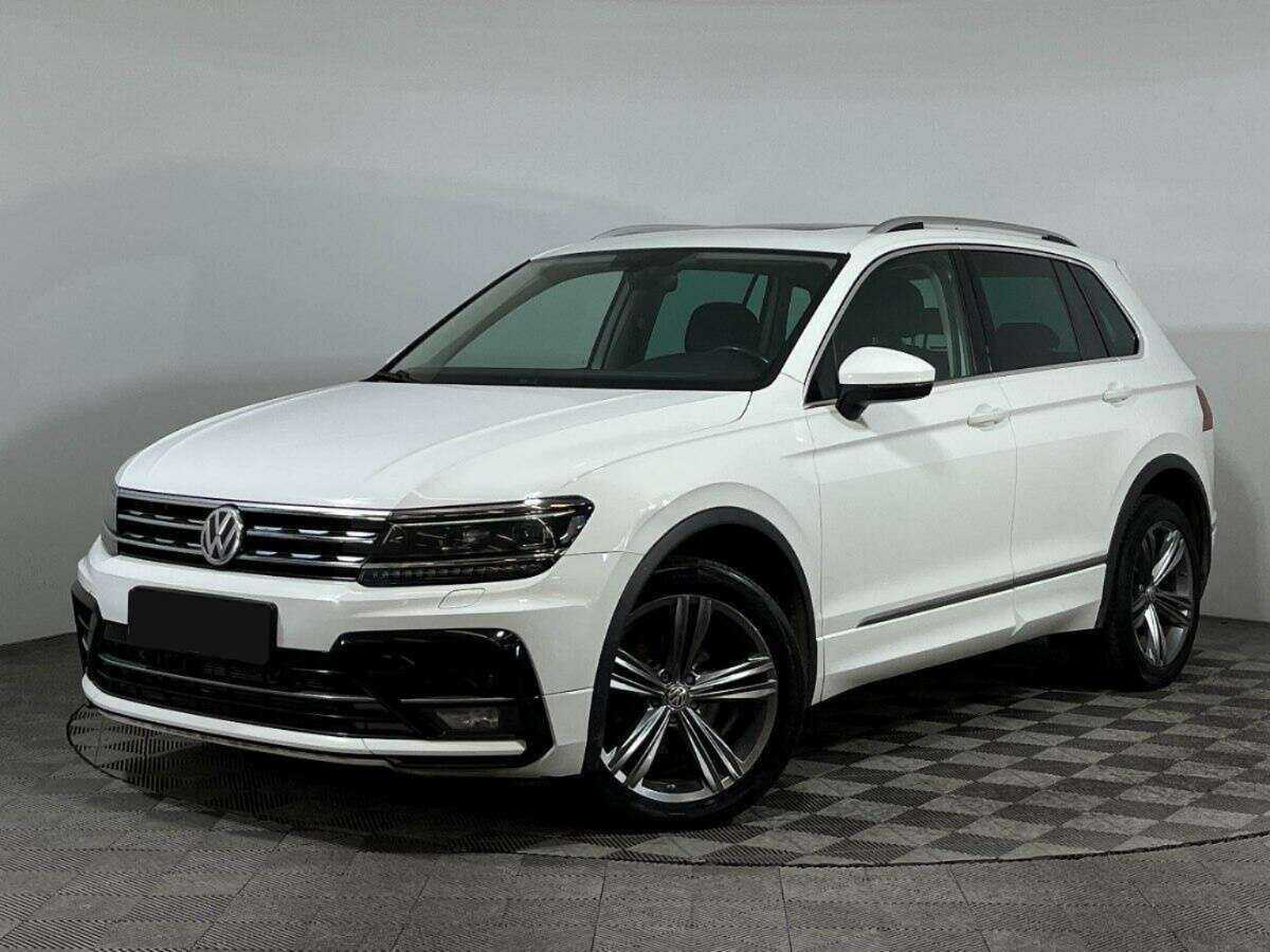 Купить Volkswagen Tiguan с пробегом. Посмотреть фото