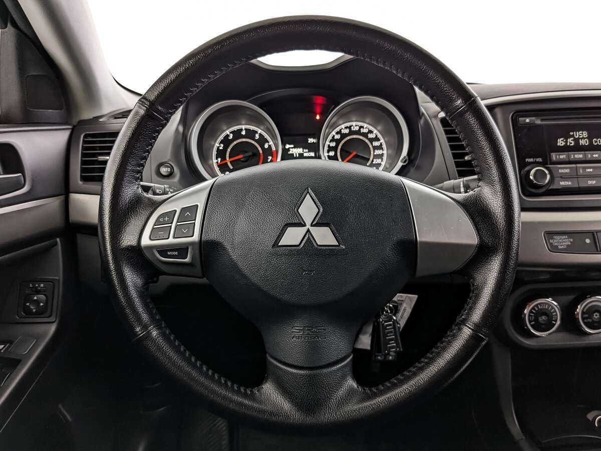 Купить Mitsubishi Lancer с пробегом. Фото: #16
