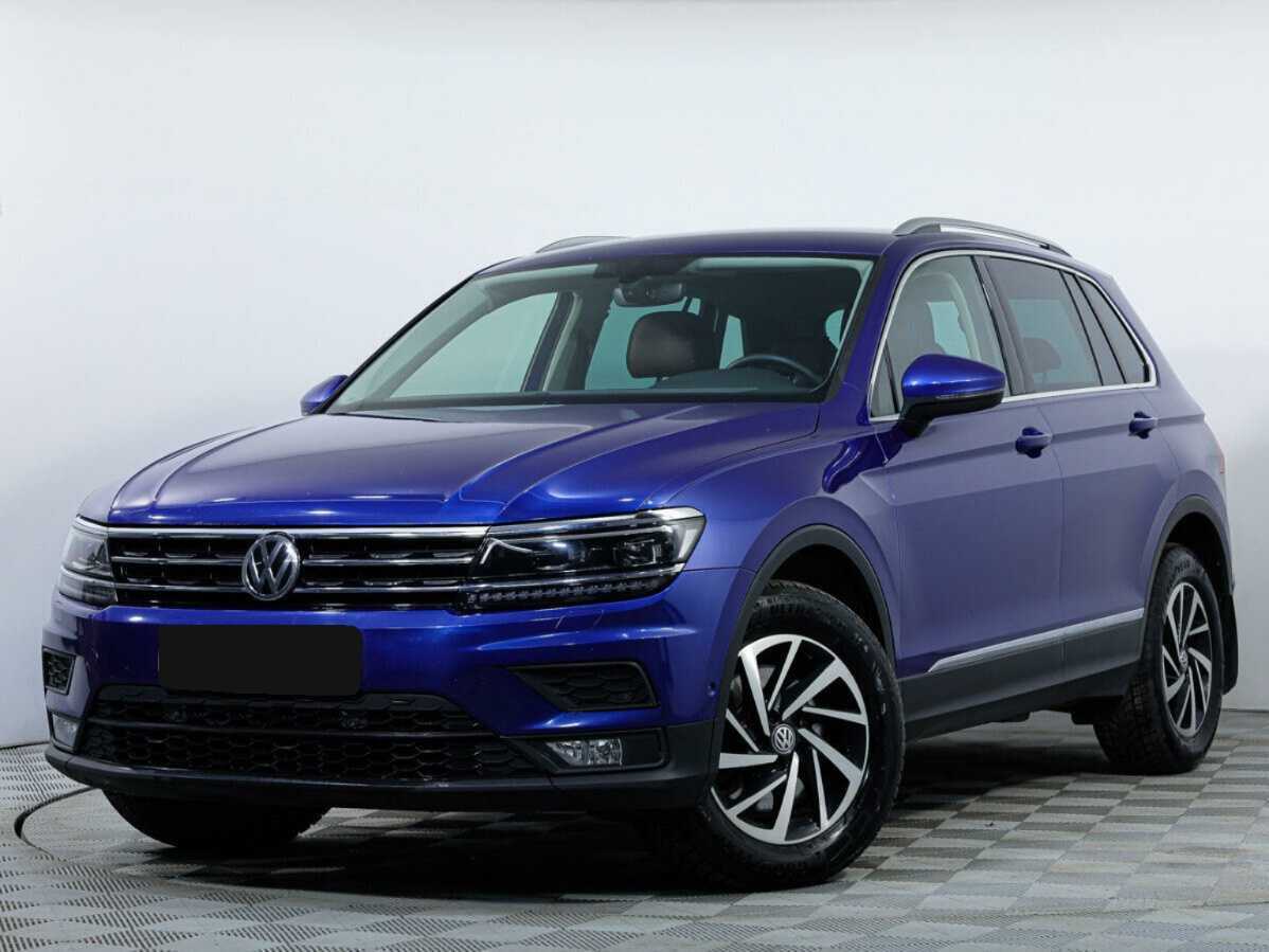 Купить Volkswagen Tiguan с пробегом. Посмотреть фото