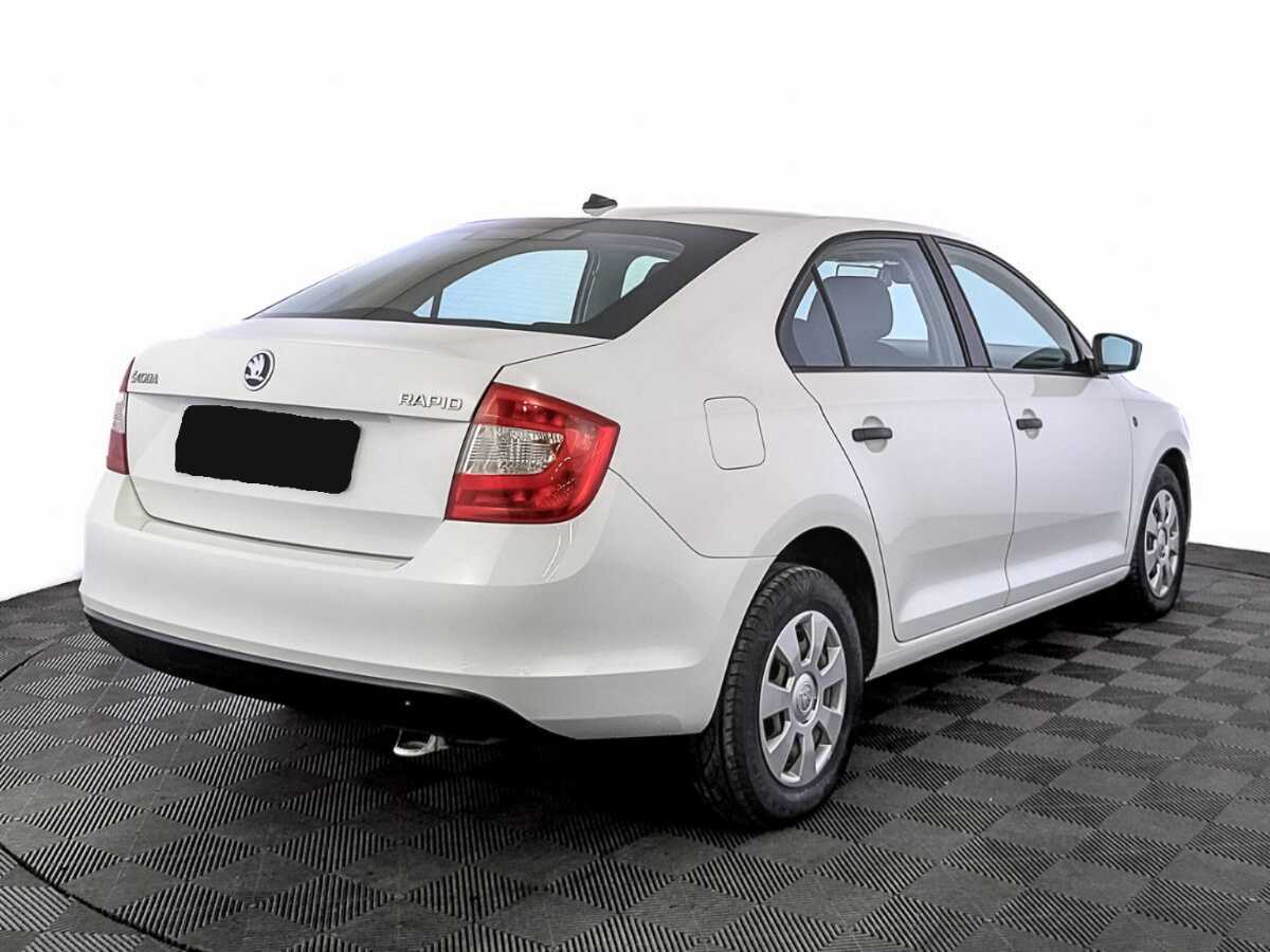Купить Skoda Rapid с пробегом. Фото: #4