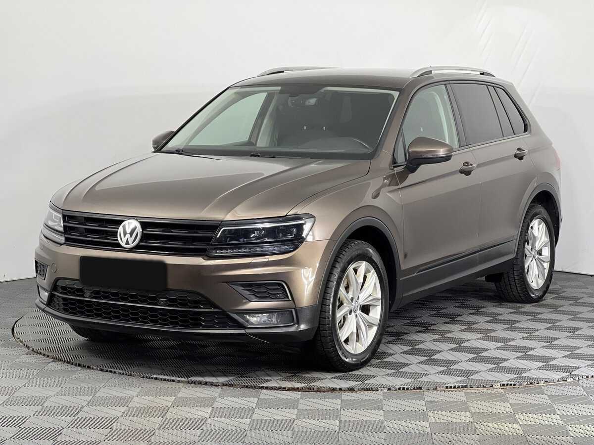 Купить Volkswagen Tiguan с пробегом. Посмотреть фото
