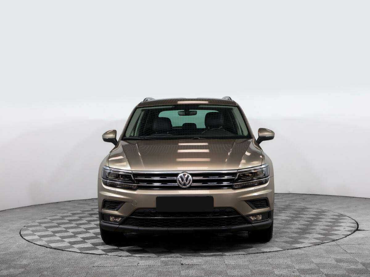 Купить Volkswagen Tiguan с пробегом. Посмотреть фото
