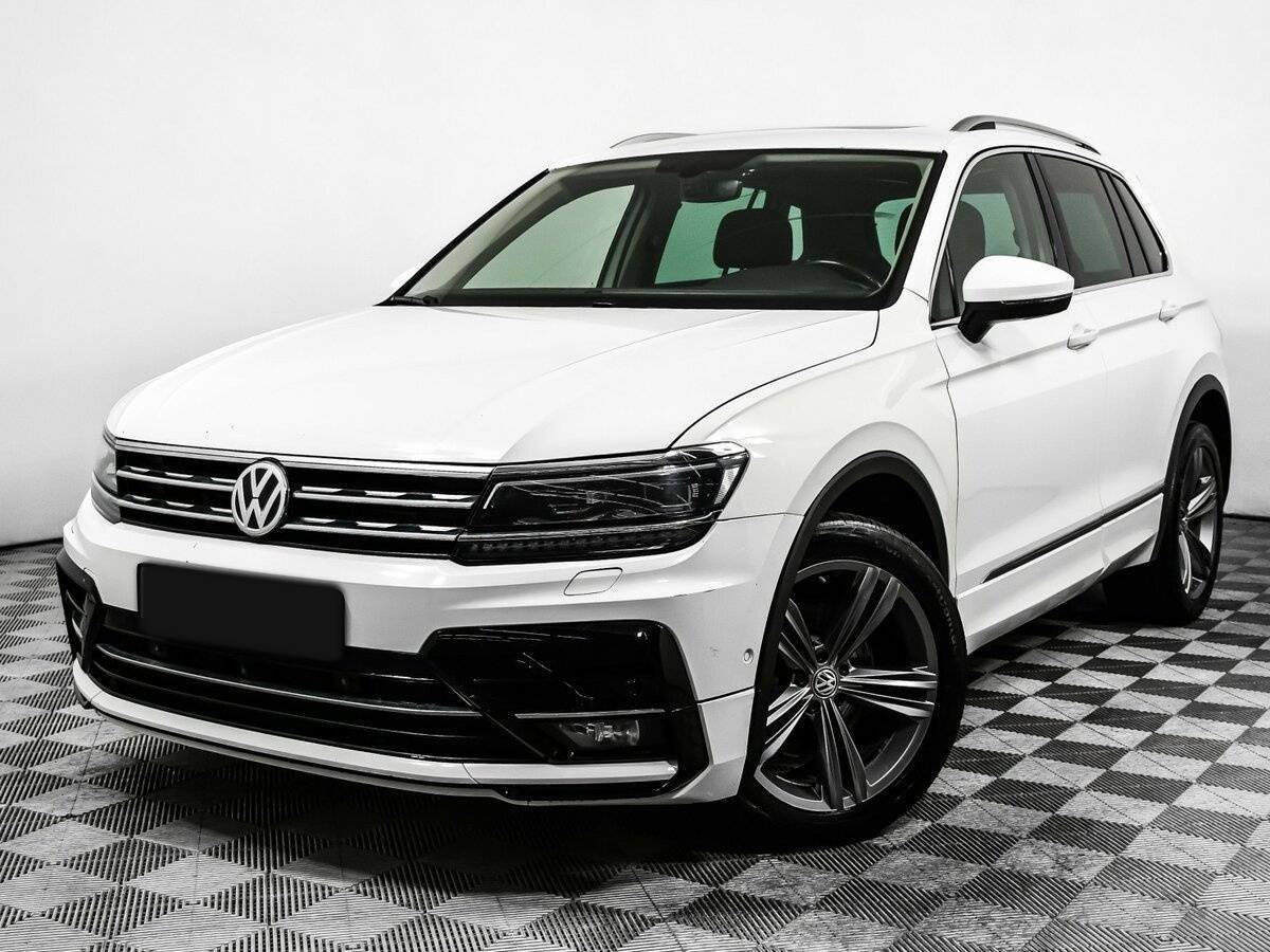 Купить Volkswagen Tiguan с пробегом. Посмотреть фото