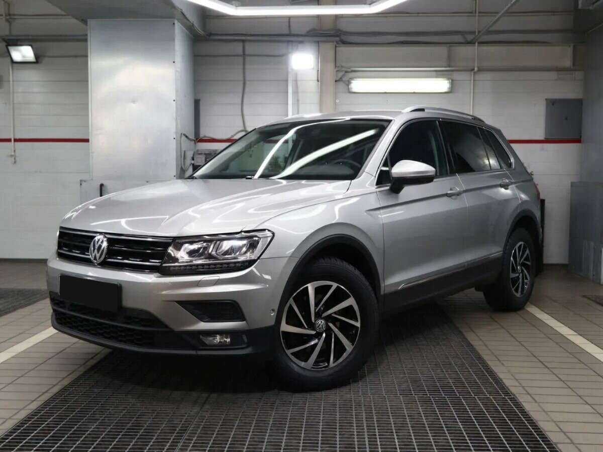 Купить Volkswagen Tiguan с пробегом. Посмотреть фото
