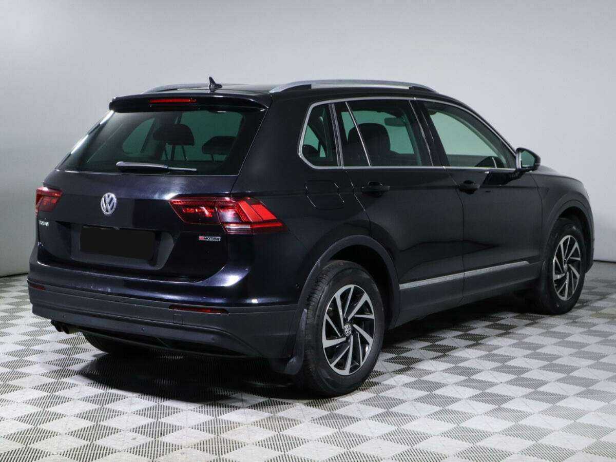 Купить Volkswagen Tiguan с пробегом. Фото: #2