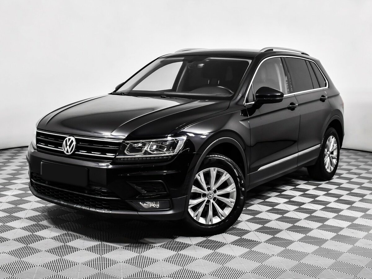 Купить Volkswagen Tiguan с пробегом. Посмотреть фото