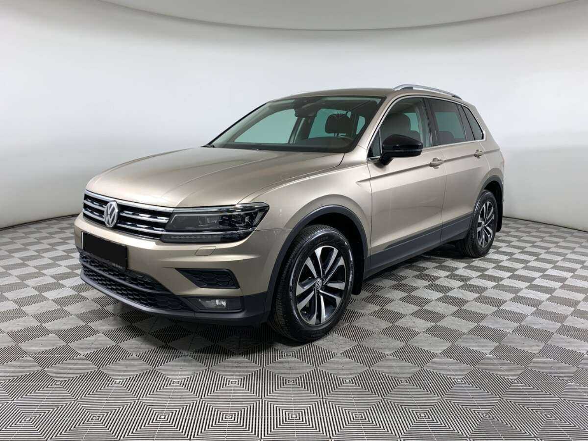 Купить Volkswagen Tiguan с пробегом. Посмотреть фото