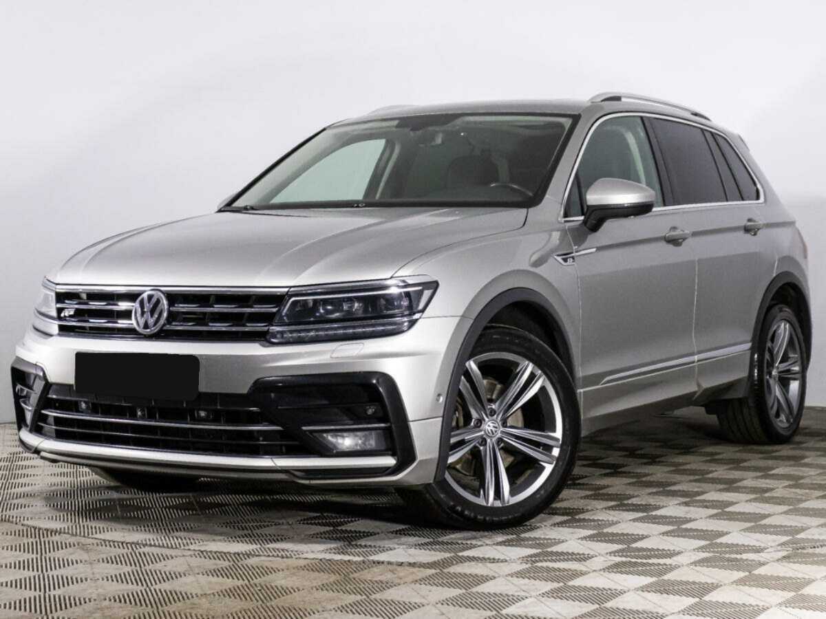 Купить Volkswagen Tiguan с пробегом. Посмотреть фото