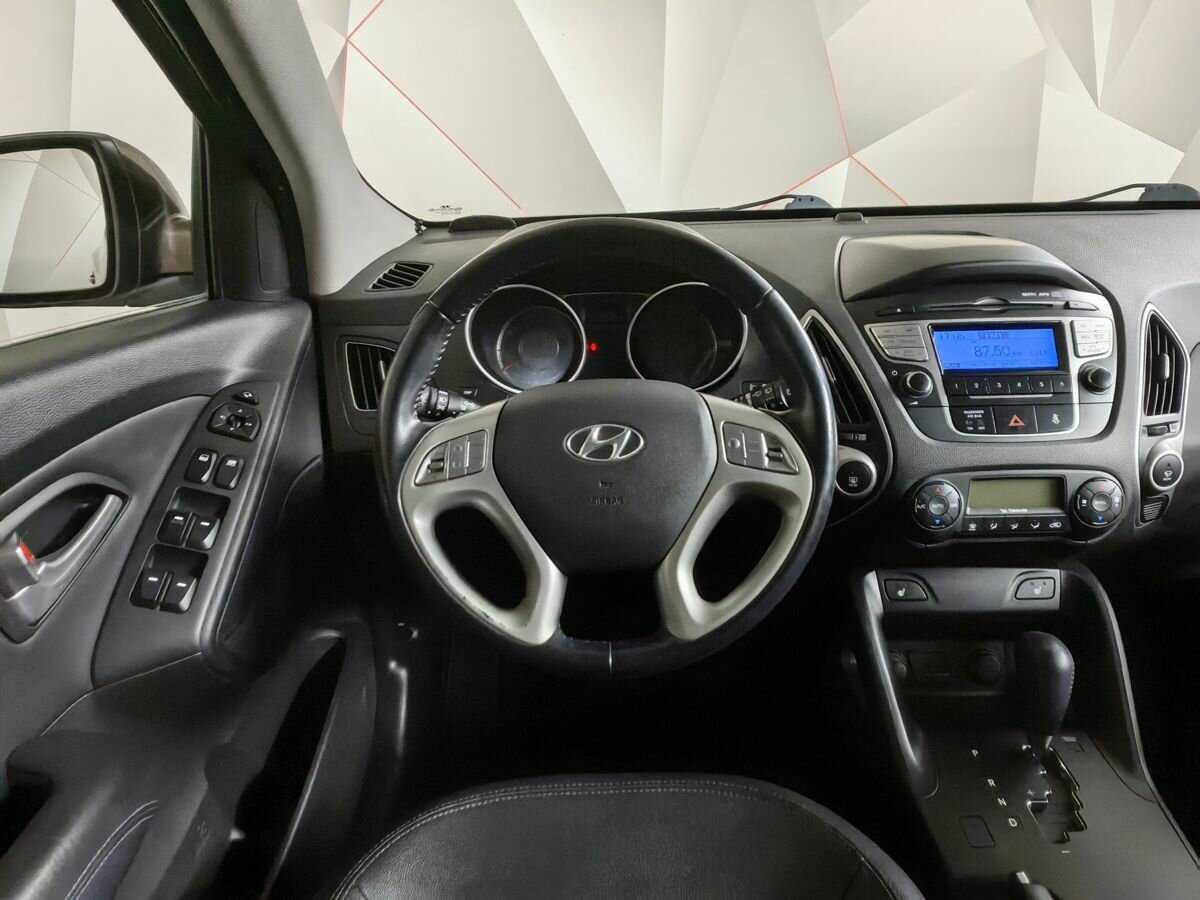 Купить Hyundai ix35 с пробегом. Фото: #12