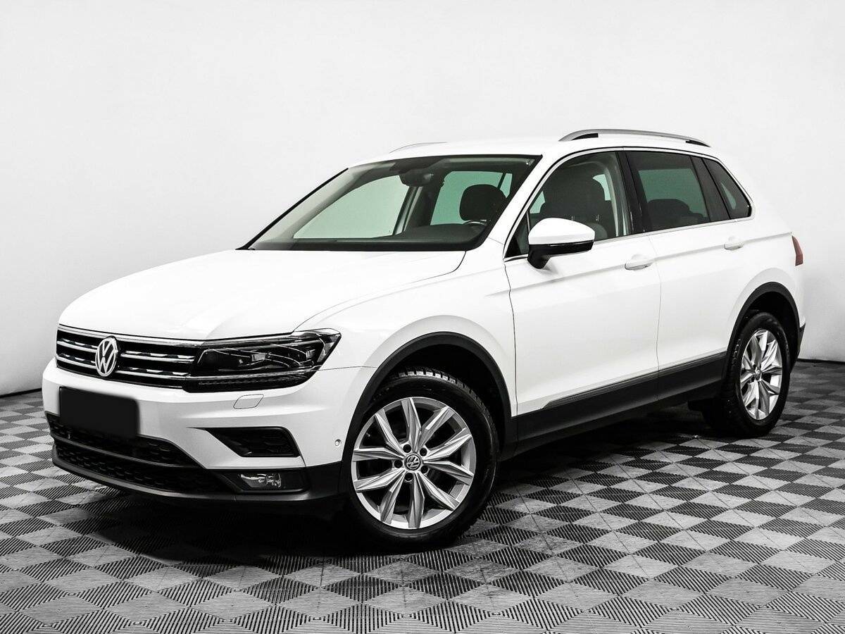 Купить Volkswagen Tiguan с пробегом. Посмотреть фото