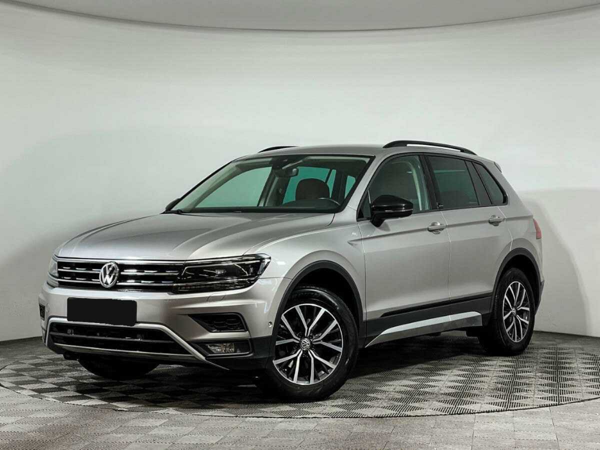 Купить Volkswagen Tiguan с пробегом. Посмотреть фото