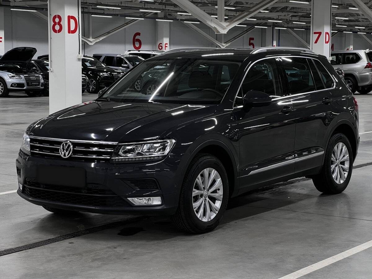 Купить Volkswagen Tiguan с пробегом. Посмотреть фото