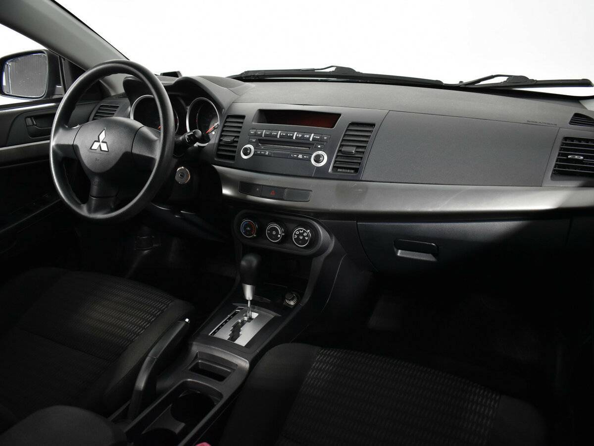 Купить Mitsubishi Lancer с пробегом. Фото: #9