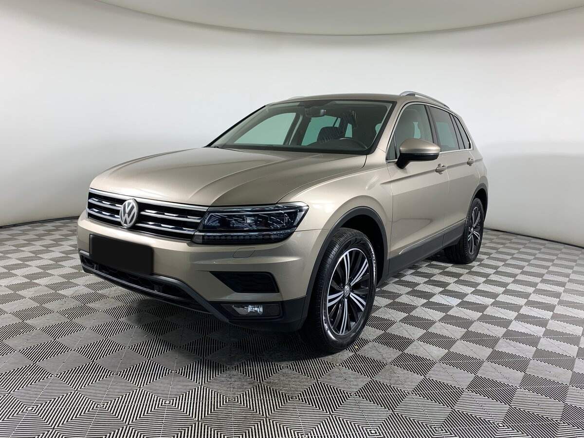 Купить Volkswagen Tiguan с пробегом. Посмотреть фото