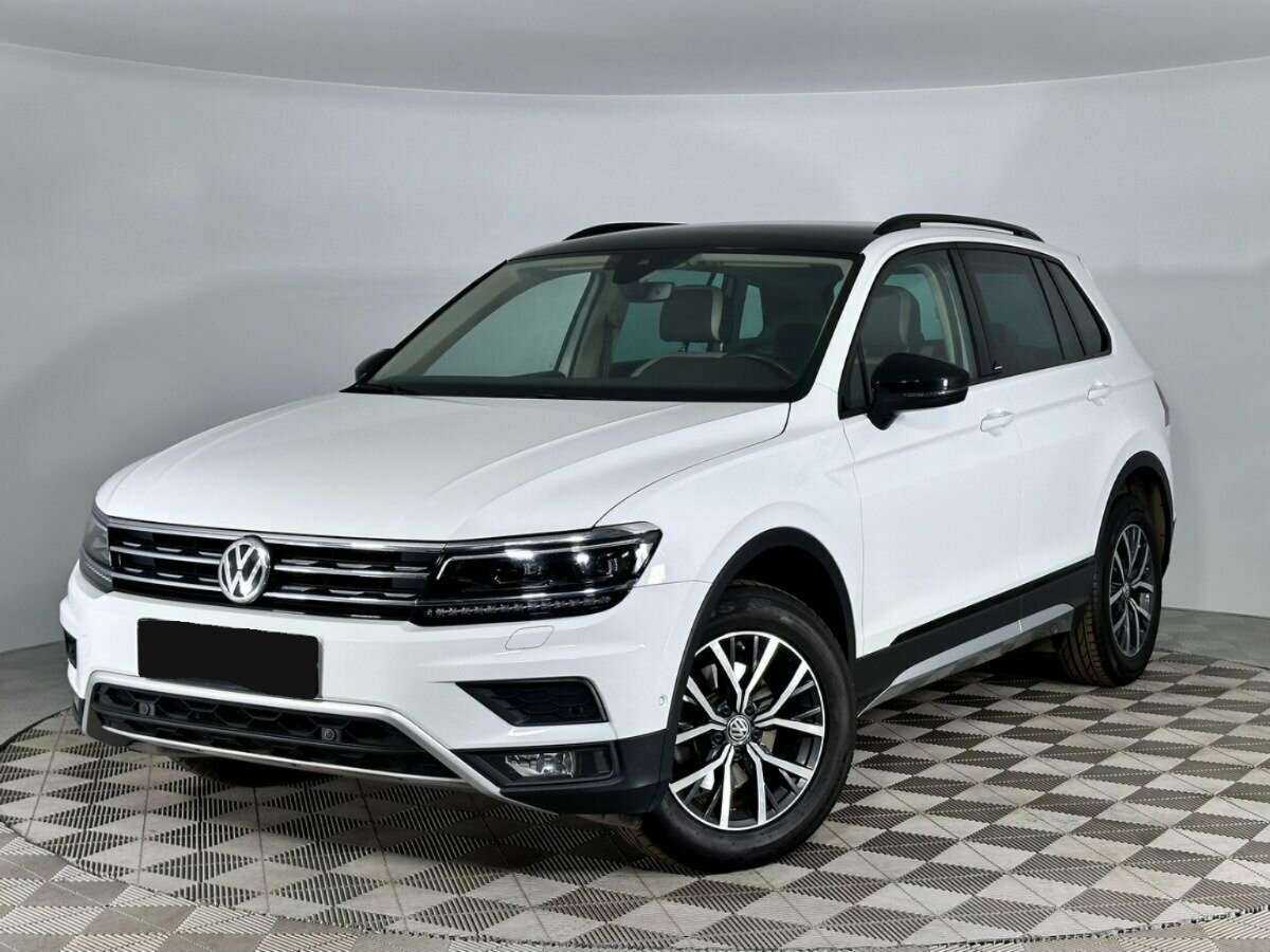 Купить Volkswagen Tiguan с пробегом. Посмотреть фото