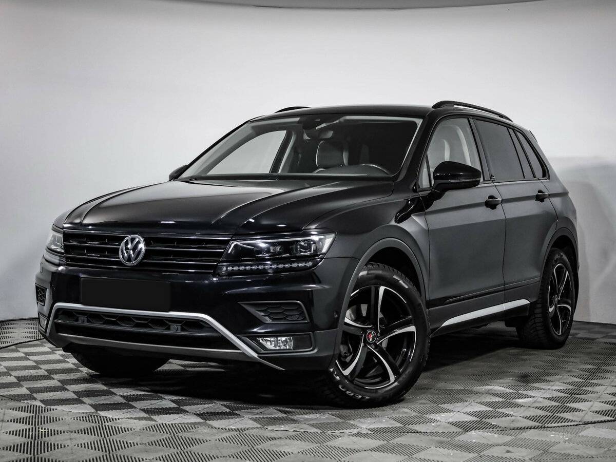 Купить Volkswagen Tiguan с пробегом. Посмотреть фото