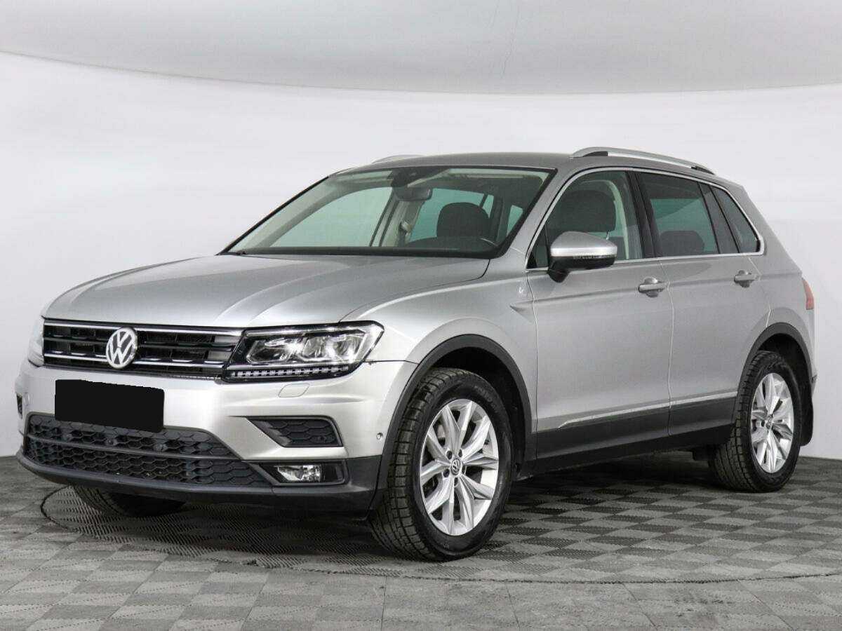 Купить Volkswagen Tiguan с пробегом. Посмотреть фото