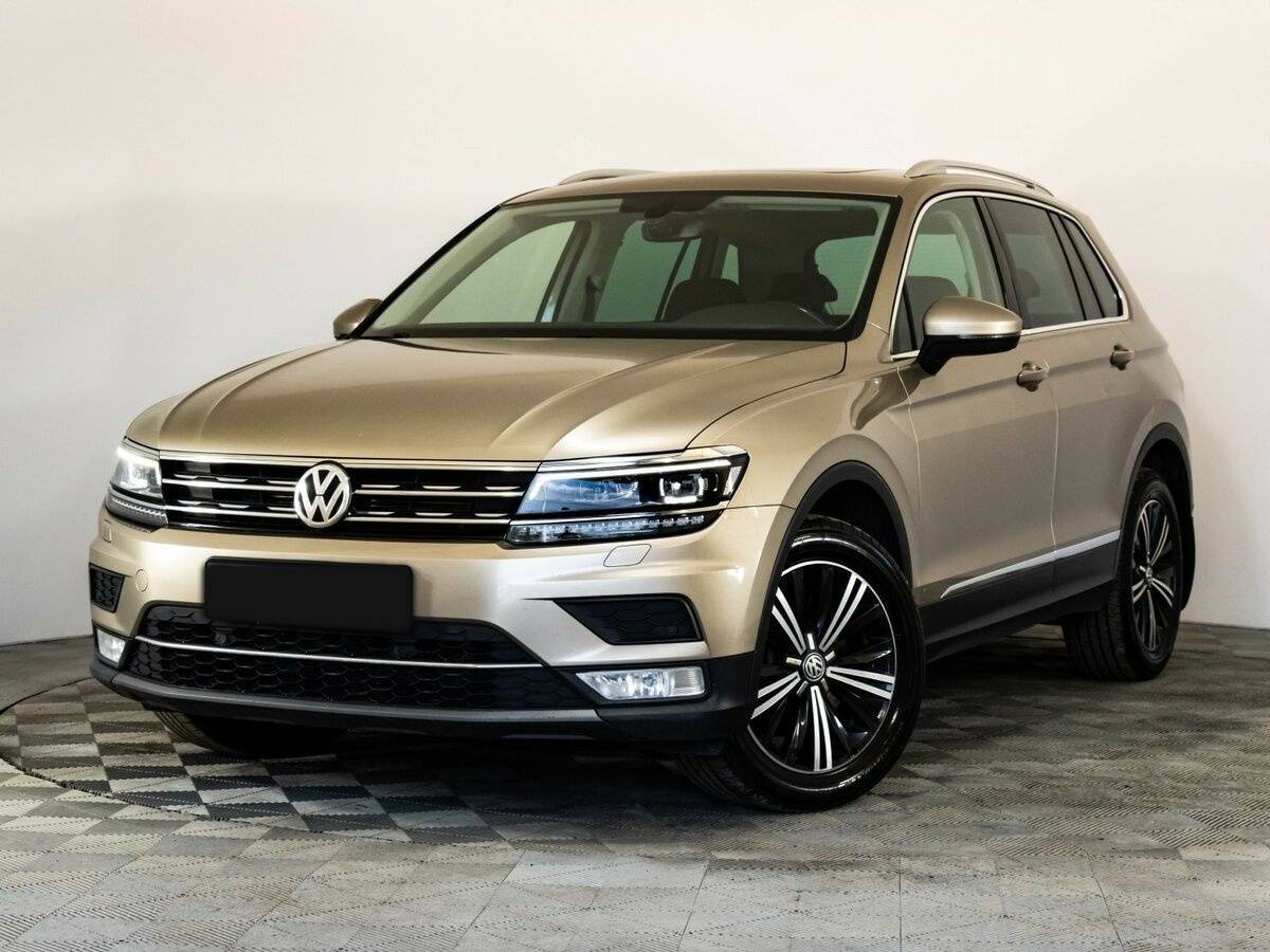 Купить Volkswagen Tiguan с пробегом. Посмотреть фото