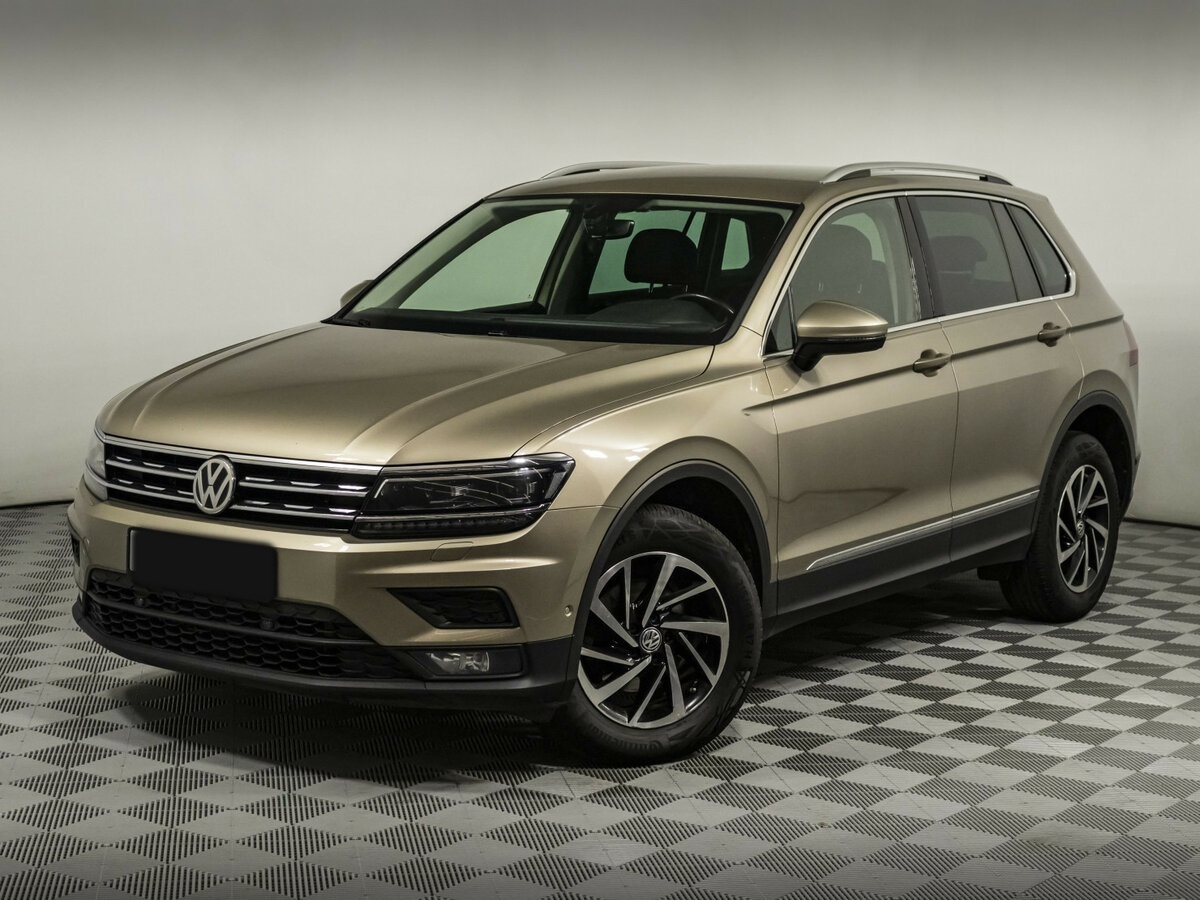Купить Volkswagen Tiguan с пробегом. Посмотреть фото