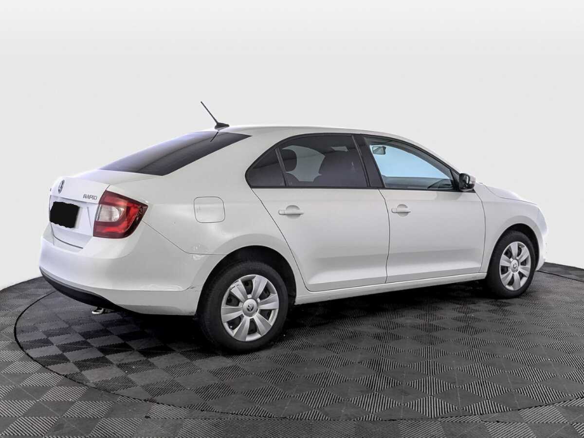 Купить Skoda Rapid с пробегом. Фото: #4