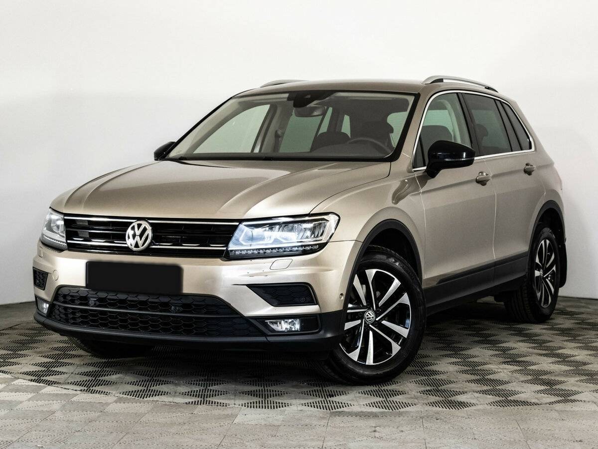 Купить Volkswagen Tiguan с пробегом. Посмотреть фото